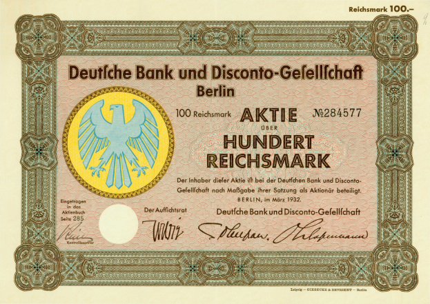 Alter deutscher Bankschein mit einem Vogel-Design und der Aufschrift "Deutsche Bank und Disconto-Gesellschaft Berlin".