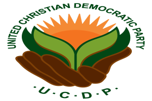 Logo der Vereinigte Christdemokratische Partei (UCDP): eine Hand, die eine hellgelbe Blume mit einem grünen Stiel und Blättern hält, zentriert innerhalb eines blauen und gelben Kreises auf einem weißen Hintergrund, mit dem Text "UCDP" in fetter schwarzer Schrift darunter.