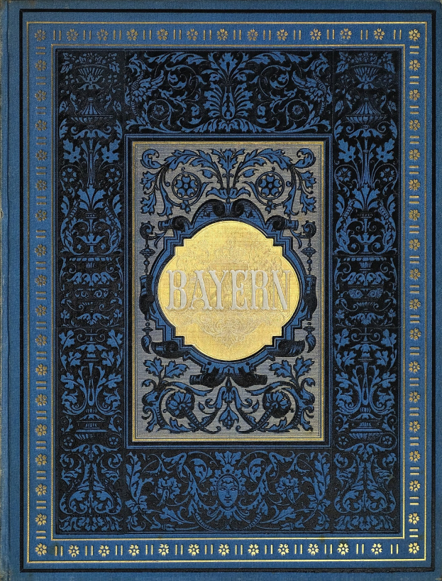 Ein blau-goldenes Buch mit der Aufschrift 'Bayern', das mit detailreichen Verzierungen versehen ist.