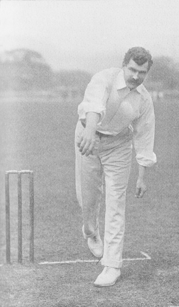 Ein Mann in weißem Hemd und Hose spielt Cricket mit Wickets auf dem Boden, Bäumen und Himmel im Hintergrund, mit dem Text "Cricket-Spieler des Jahres" unten.