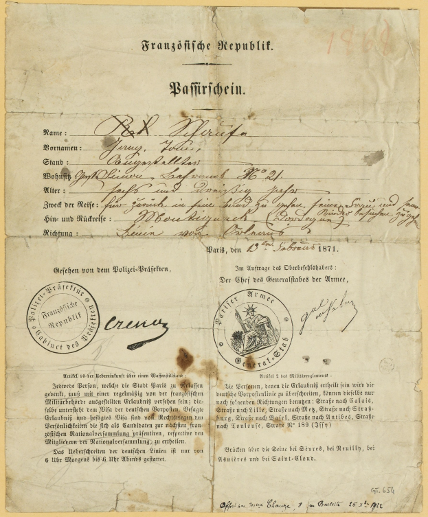 Gelblicher Brief der deutschen Regierung mit rundem schwarzumrandetem Stempel und schwarzer Tinte.