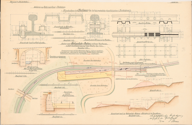 Altes Buch mit detaillierten Zeichnungen und Text eines Eisenbahnlayouts, einschließlich einer Zugschienen-Illustration.